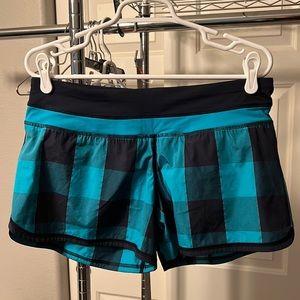 Lululemon 4inch short. Size 8. Teal/navy checker